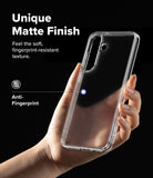 Bundle 15% Galaxy S26 FE Case + Screen / Camera Protectors | Fusion 
Matte all-groups - A hand holds a clear smartphone case with a matte finish against a black background. White text on the left reads 'Unique Matte Finish' and 'Feel the soft, fingerprint-resistant texture.