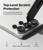 Galaxy S26 Ultra | Camera Lens Frame Glass - Galaxy S26 Ultra - A utility knife blade presses against a phone camera lens protector, demonstrating 9H scratch resistance.