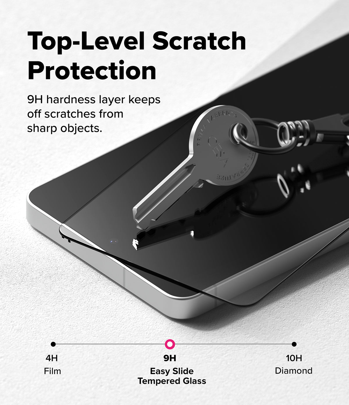 [Bundle] Galaxy S26 Ultra | Onyx Magnetic - A metal key rests on a smartphone screen protector, demonstrating 9H hardness scratch resistance.