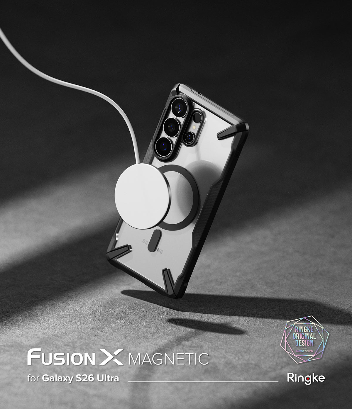 [Bundle] Galaxy S26 Ultra | Fusion-X Magnetic - Bundle: Galaxy S26 Ultra | Fusion-X Magnetic - Galaxy S26 Ultra in a black Fusion-X case charging with a magnetic disc.
