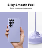[Bundle] Galaxy S26 Ultra | Silicone Magnetic - Hand holding a lavender silicone phone case next to pouring liquid.