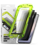 Galaxy S26 Screen Protector | Easy Slide Privacy Tempered Glass - Galaxy S26 Screen Protector - Neon green installation tray aligning a privacy glass screen protector onto a smartphone.