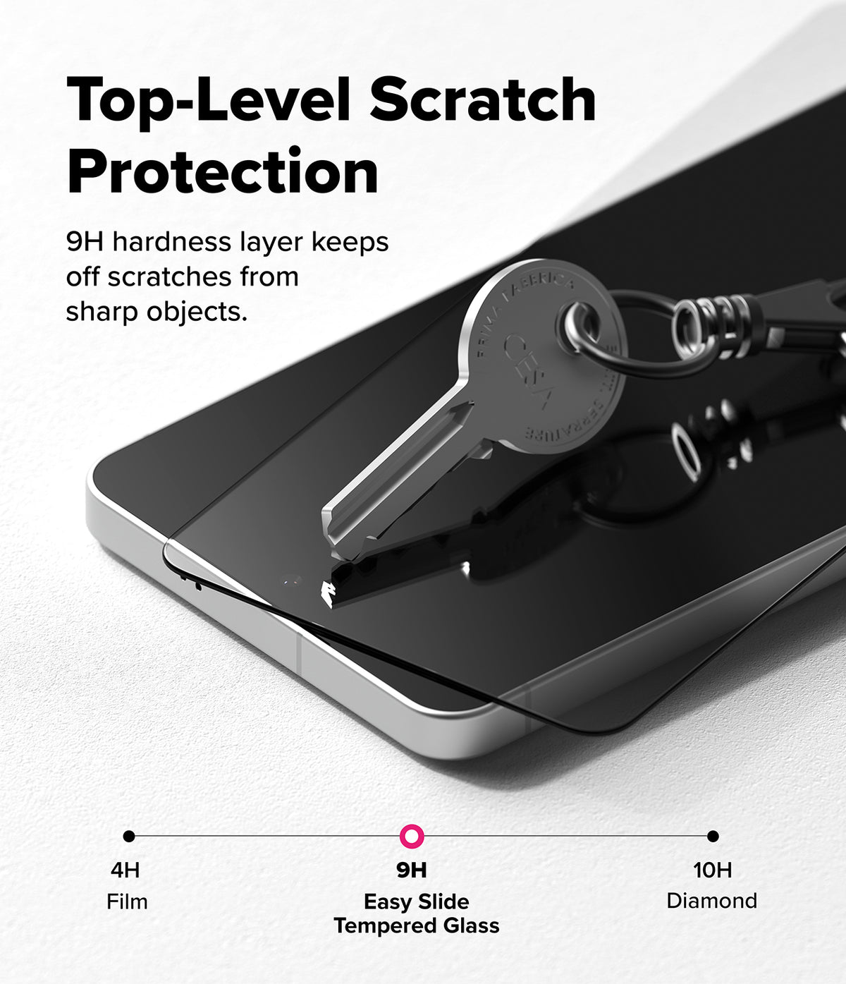 [Bundle] Galaxy S26 Plus | Onyx - Galaxy S26 Plus | Onyx - A metal key resting on a smartphone screen protector, demonstrating 9H scratch resistance.