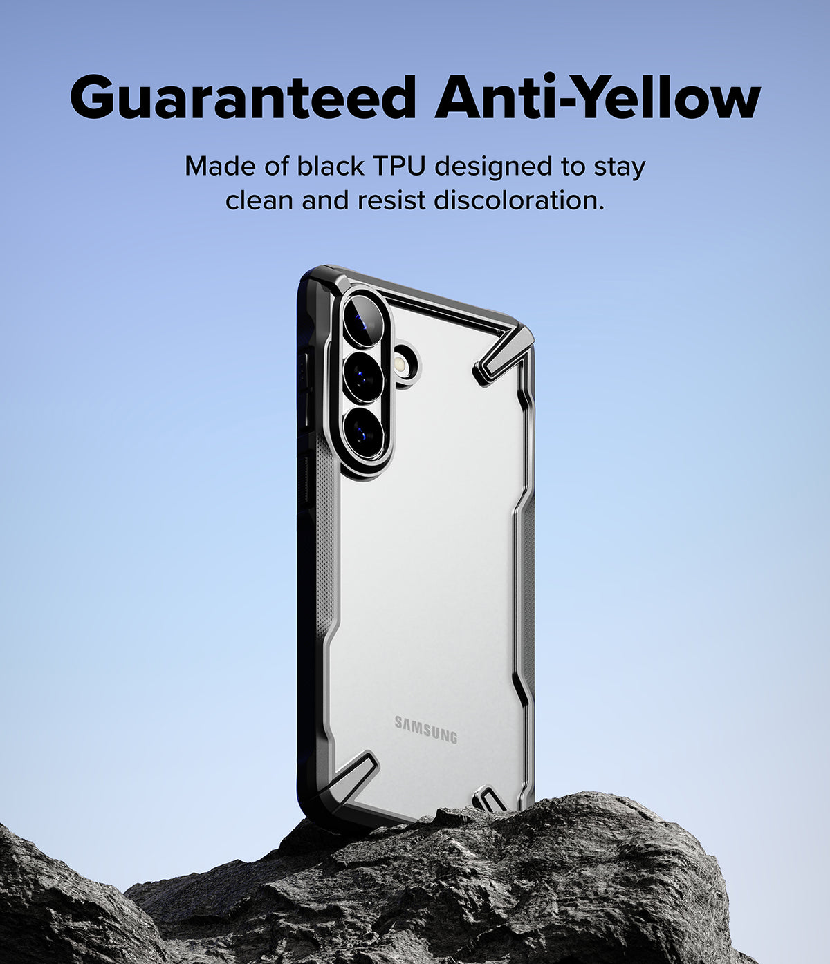 Galaxy S26 Plus Case | Fusion-X - Black Fusion-X case on a phone standing on a rock against a blue sky background.