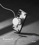 [Bundle] Galaxy S26 Plus | Fusion-X Magnetic - Galaxy S26 Plus | Fusion-X Magnetic - A Galaxy S26+ in a clear Fusion-X case with a magnetic charger attached to the back.