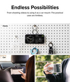 Ringke Smart Ring Magnetic - A phone with a magnetic ring hanging on a pegboard, mounted in a car, and held by a finger.