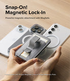 Card Holder | Stand Grip Magnetic Card Holder Wallet - Card Holder - Hands holding a gray magnetic card wallet with a finger strap over smartphones with MagSafe rings.