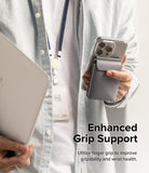 Card Holder | Stand Pocket Magnetic - A person holding a phone with a grey magnetic card holder and stand attached.