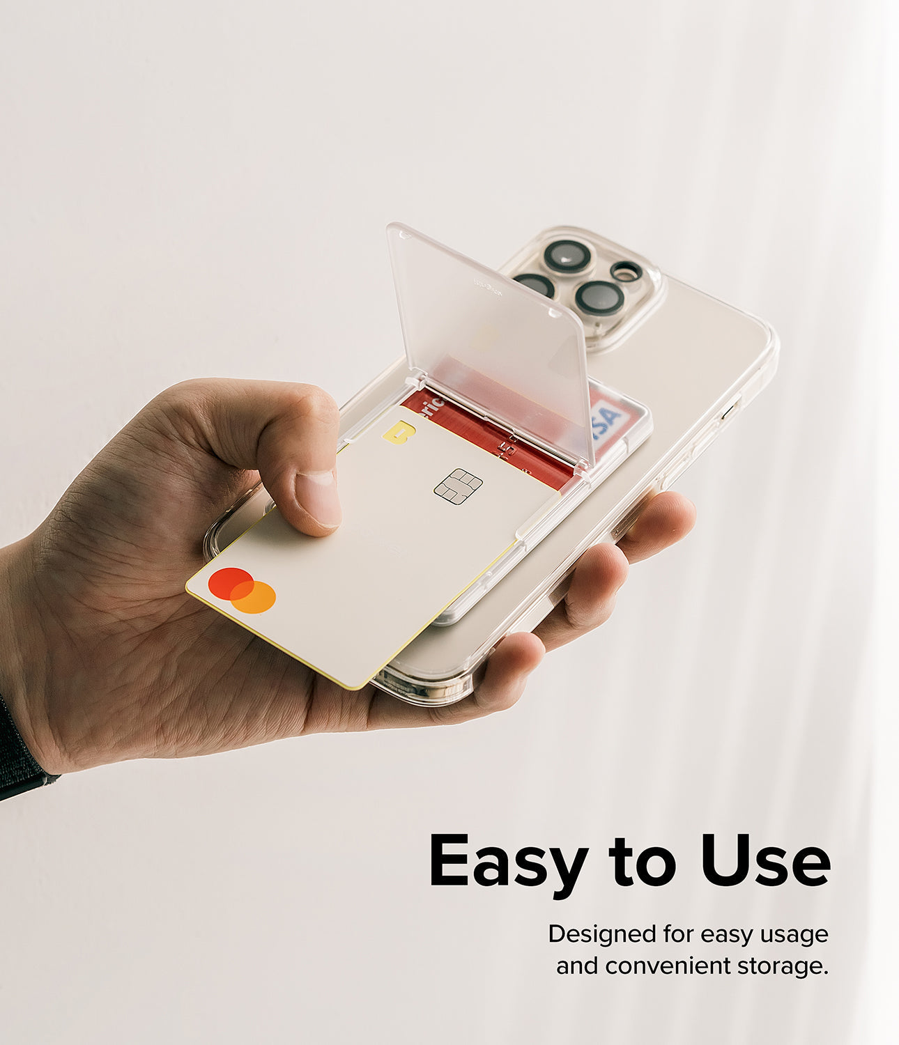 Card Holder | Stand Slot - Hand holding a clear phone case with a flip-out card slot containing two credit cards.