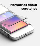 Card Holder | Stand Slot - A clear protective cover slides over a colorful credit card stored in a phone case.