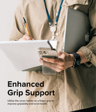 Card Holder | Stand Slot - Person holding a phone with a card holder stand attached, using it as a finger grip while holding a laptop.