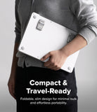 Step-Fit Mini Stand - A person in a gray sweater holds a compact white foldable travel case against their shoulder, with text reading 'Compact & Travel-Ready' and 'Foldable, slim design for minimal bulk and effortless portability.' on a light gray background.