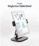 Iron Tablet Stand - A tablet displaying global social networking data mounted on an adjustable black metal stand.