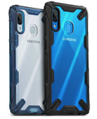 Galaxy A30 Case | Fusion-X - Two rugged Samsung Galaxy A30 cases with clear backs and reinforced black or blue bumpers.
