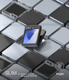 Galaxy Z Flip 7 FE Case | Slim - A black slim case on a folded Galaxy Z Flip phone, surrounded by a grid of silver and black phones.