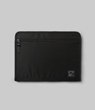 Pad Pouch | Smart Zip Pouch - A black rectangular zippered tablet sleeve with a small branded label on the bottom right.