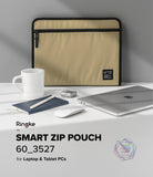 Pad Pouch | Smart Zip Pouch - Tan zippered laptop sleeve with a mug, notebook, mouse, and laptop on a white desk.