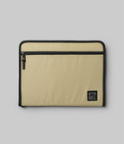 Pad Pouch | Smart Zip Pouch - Beige rectangular zippered tablet sleeve with black trim and a small branded label on the corner.