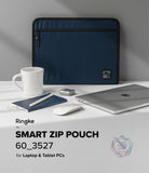 Pad Pouch | Smart Zip Pouch - Navy blue zippered laptop sleeve with a coffee mug, notebook, mouse, and laptop on a desk.