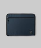 Pad Pouch | Smart Zip Pouch - Navy blue rectangular zippered pouch with a black logo patch and side zipper pull.