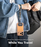 Holder Link Tactical Webbing Hand Strap - Camo tactical wrist strap attached to a smartphone case with a metal carabiner.