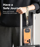 Holder Link Tactical Webbing Hand Strap - Camo webbing strap attached to a phone case hanging from luggage handle.