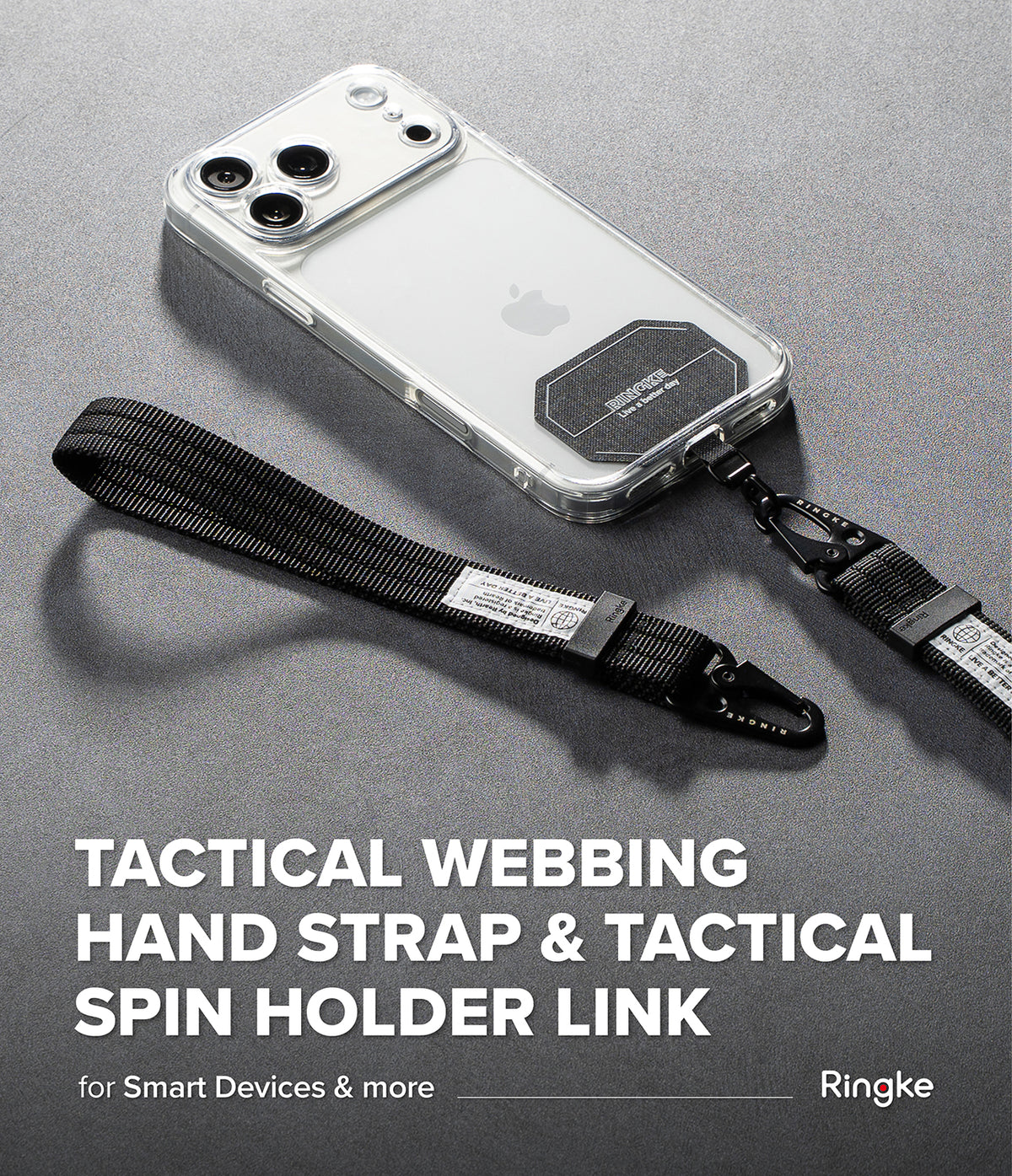 Holder Link Tactical Webbing Hand Strap - A clear smartphone case with a black tactical webbing hand strap and black spin holder link, shown on a gray surface with large text reading 'TACTICAL WEBBING HAND STRAP & TACTICAL SPIN HOLDER LINK' and the Ringke logo.