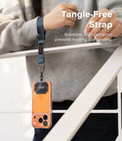 Holder Link Tactical Webbing Hand Strap - A blue tactical wrist strap with a 360-degree swivel clip attached to a phone.