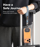 Holder Link Tactical Webbing Hand Strap - A blue tactical wrist strap attached to a phone case hanging from luggage.