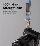 Holder Link Tactical Webbing Hand Strap - Blue webbing strap with a zinc alloy carabiner attached to a black camera.