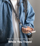 Holder Link Tactical Webbing Lanyard Strap - Person wearing a black tactical lanyard attached to a smartphone case.