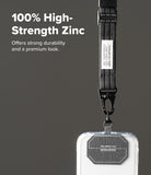Holder Link Tactical Webbing Lanyard Strap - A clear phone case with a black textured strap and metal clasp, shown against a dark gray background with promotional text reading '100% High-Strength Zinc'.