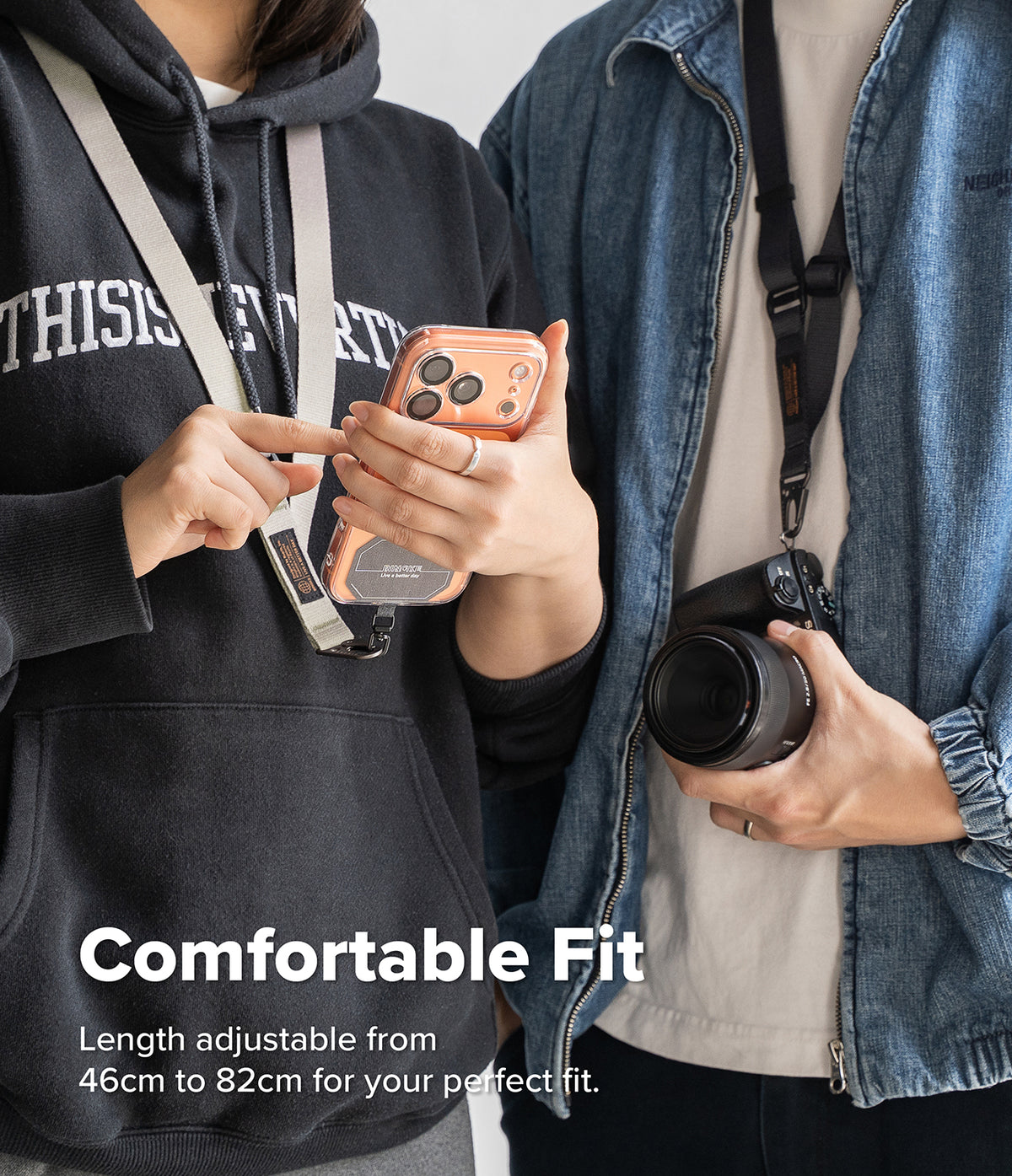 Holder Link Tactical Webbing Lanyard Strap - Two people wearing phone straps and holding phone cases, with one person pointing at the case. Text at the bottom reads 'Comfortable Fit' and 'Length adjustable from 46cm to 82cm for your perfect fit.
