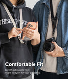 Holder Link Tactical Webbing Lanyard Strap - Two people wearing phone straps and holding phone cases, with one person pointing at the case. Text at the bottom reads 'Comfortable Fit' and 'Length adjustable from 46cm to 82cm for your perfect fit.