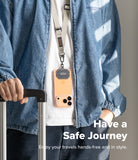 Holder Link Tactical Webbing Lanyard Strap - A person wearing a beige tactical lanyard holding a smartphone around their neck.