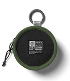 Mini Pouch | Tambourine Bag - Round olive green pouch with a black center patch featuring coordinates and Ringke branding.