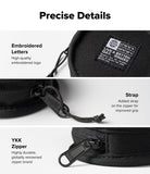 Mini Pouch | Tambourine Bag - Close-up of embroidered logo, zipper pull strap, and durable YKK zipper on a black pouch.