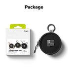 Mini Pouch | Tambourine Bag - Black circular pouch with a carabiner and branded patch next to its retail packaging.