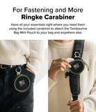 Mini Pouch | Tambourine Bag - A round olive and black pouch attached to a belt loop and a backpack strap via a carabiner.