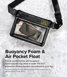 Waterproof Pouch Case | Sling Bag - Black waterproof pouch containing a phone and cash, floating on water surface.