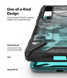 Mi 10 / 10 Pro Case | Fusion-X - Close-up of a rugged black camo phone case on a teal Xiaomi Mi 10 with technical labels.