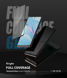 Mi 10T Lite 5G / 10i 5G Screen Protector | Invisible Defender - Three smartphones with tempered glass screen protectors.