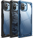 Mi 11 Case | Fusion-X - Three Mi 11 phones in clear, camo, and blue Fusion-X rugged protective cases against a white background.