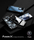 Xiaomi 12T / 12T Pro Case | Fusion-X - Three Fusion-X phone cases in clear, camo, and black on a dark surface.
