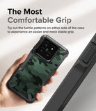 Xiaomi 14 Case | Fusion-X - Hand holding a camo-patterned phone case with tactile side grips for improved stability.