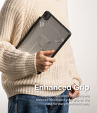 Fusion Sketch Stand | iPad - Person in a cream sweater holding a clear iPad case with a built-in stand and textured black edges.