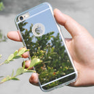 iPhone 6s / 6 Case | Mirror - Hand holding a reflective mirror-finish iPhone case showing a garden reflection.