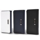 iPhone 8 Plus / 7 Plus Case | Wallet - Three leather wallet cases in white, navy, and black with silver metal branding.