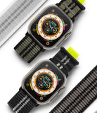 Apple Watch 49·46·45·44·42 mm | Sports Air Loop - Two Apple Watches with Wayfinder faces and patterned fabric bands.