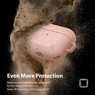 AirPods Pro Case - Peach Pink - A peach pink AirPods Pro case surrounded by a cloud of dust against a black background.